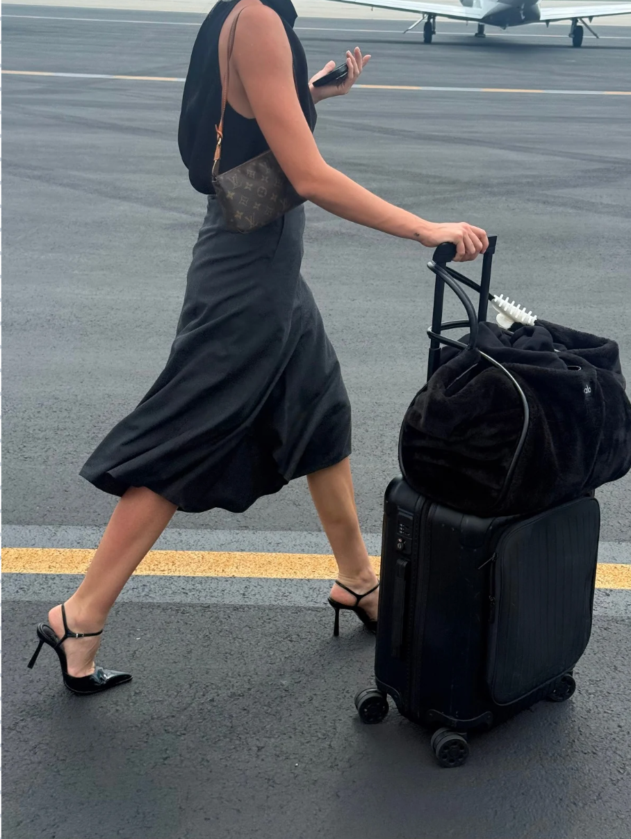 How to Fit Your Skincare and 189 Outfits in One Bag