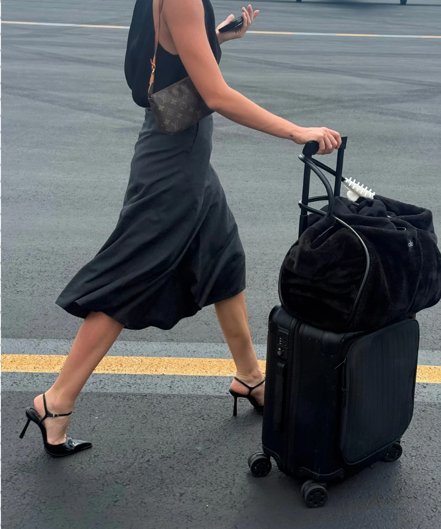 How to Fit Your Skincare and 189 Outfits in One Bag