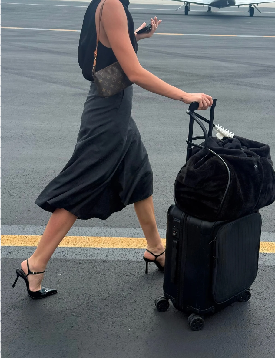 How to Fit Your Skincare and 189 Outfits in One Bag